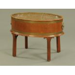 A Georgian style oval mahogany planter,