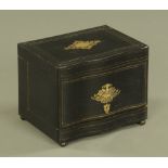 A 19th century French ebonised decanter box, inlaid in brass and with brass stringing,