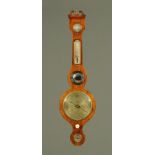 A 19th century inlaid mahogany banjo barometer, "Warranted Direct". Height 98 cm.