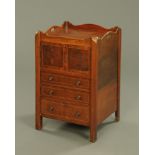 A Georgian mahogany commode, converted to a cupboard and chest. Height 75 cm, width 50 cm.