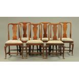 A set of six Queen Anne style walnut dining chairs, circa 1930,