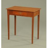 An Edwardian mahogany side table,