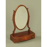 A 19th century inlaid mahogany oval dressing table mirror,