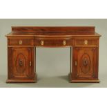 A 1920's panelled mahogany bow front sideboard of Adam style, 106 cm high, 184 cm wide, 68 cm deep.