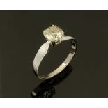 An 18 ct white gold solitaire diamond ring, diamond weight +/- 1.08 carats. size M/N.