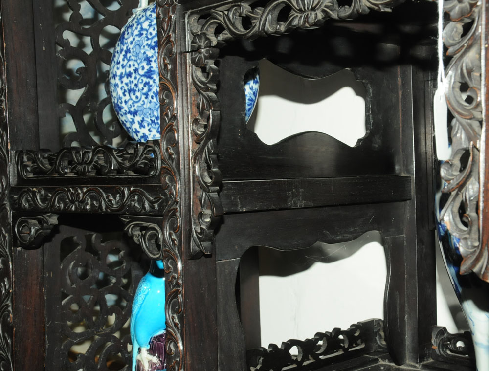 A 19th century Chinese hardwood cabinet in two sections, - Image 14 of 18
