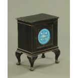 A 19th century ebonised small cupboard,