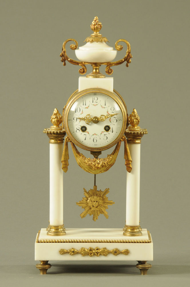 A 19th century continental marble and brass pillar clock,