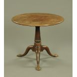 A George III mahogany tripod table, with one piece top,
