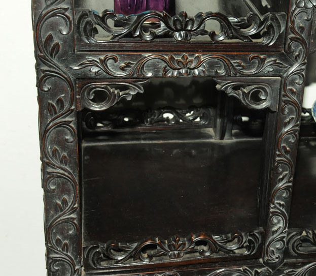 A 19th century Chinese hardwood cabinet in two sections, - Image 7 of 18