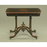 A Victorian aesthetic movement ebonised card table,