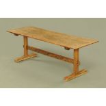 An oak refectory table with cleated two plank top,
