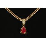 A 9 ct gold necklace, with pear shaped ruby pendant drop set in 9 ct gold,