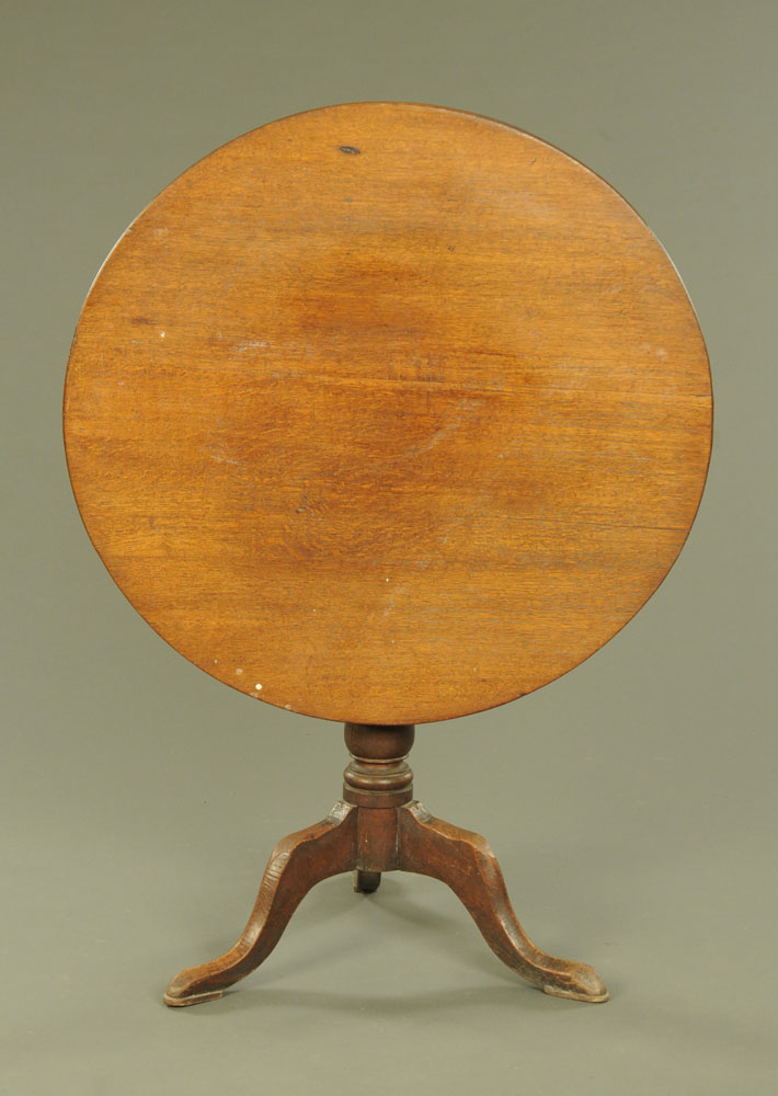 A George III oak circular snap top tripod table, 89 cm diameter x 74 cm high. - Image 2 of 2