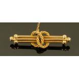 A Victorian 15 ct gold rope pattern bar brooch. 4.5 cm wide, weight 5 grams.
