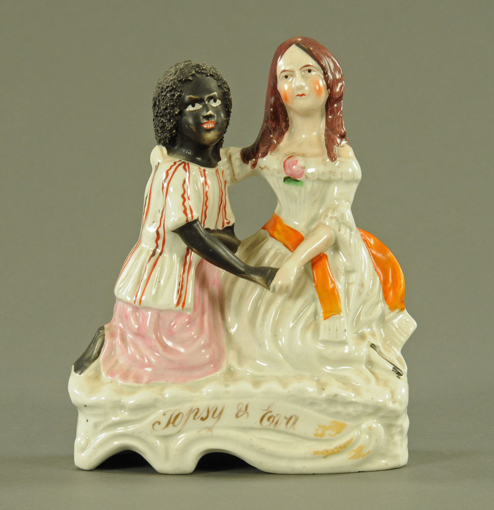 An interesting and rare 19th century Staffordshire pottery figure "Topsy and Eva",