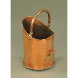 A late Victorian copper cylindrical coal receiver with folding bale handle,
