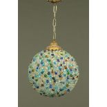 A globular coloured glass and metal chandelier. Height 39 cm, diameter +/- 33 cm.