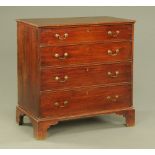 An early 19th century mahogany chest of drawers,