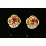 A pair of 9 ct gold ruby and diamond ear studs.