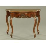 A continental walnut serpentine fronted hall table,