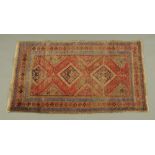 An antique Hamadan rug,