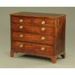 A George III mahogany chest of drawers, the top with boxwood stringing on bracket feet.