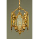 A glass and brass lantern type hall light fitting,