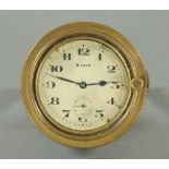 A vintage Swiss made car clock, eight day, with Arabic numerals,