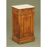 A continental marble topped bedside cabinet,