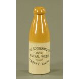 The Cockermouth Mineral Water Company Limited stoneware bottle by Bourne Denby. Height 21 cm.