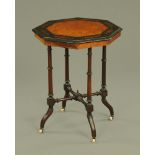 A Victorian aesthetic period walnut inlaid octagonal table,