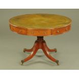 A Regency style mahogany drum table,