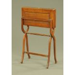 A Victorian Campaign type folding desk, with fitted leather interior. Width 62 cm.