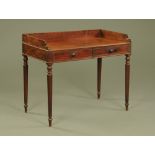 An early 19th century mahogany washstand in the manner of Gillows, with three quarter gallery,