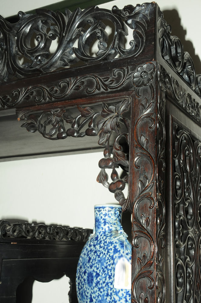 A 19th century Chinese hardwood cabinet in two sections, - Image 8 of 18