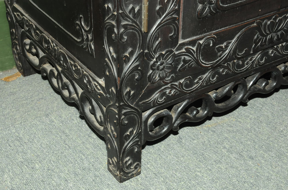 A 19th century Chinese hardwood cabinet in two sections, - Image 12 of 18