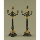 A pair of 19th century bronze three branch candelabra, in the style of Maximilian de la Fontaine.
