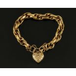 A 9 ct gold chain link bracelet with heart shaped padlock, 20 grams (see illustration).