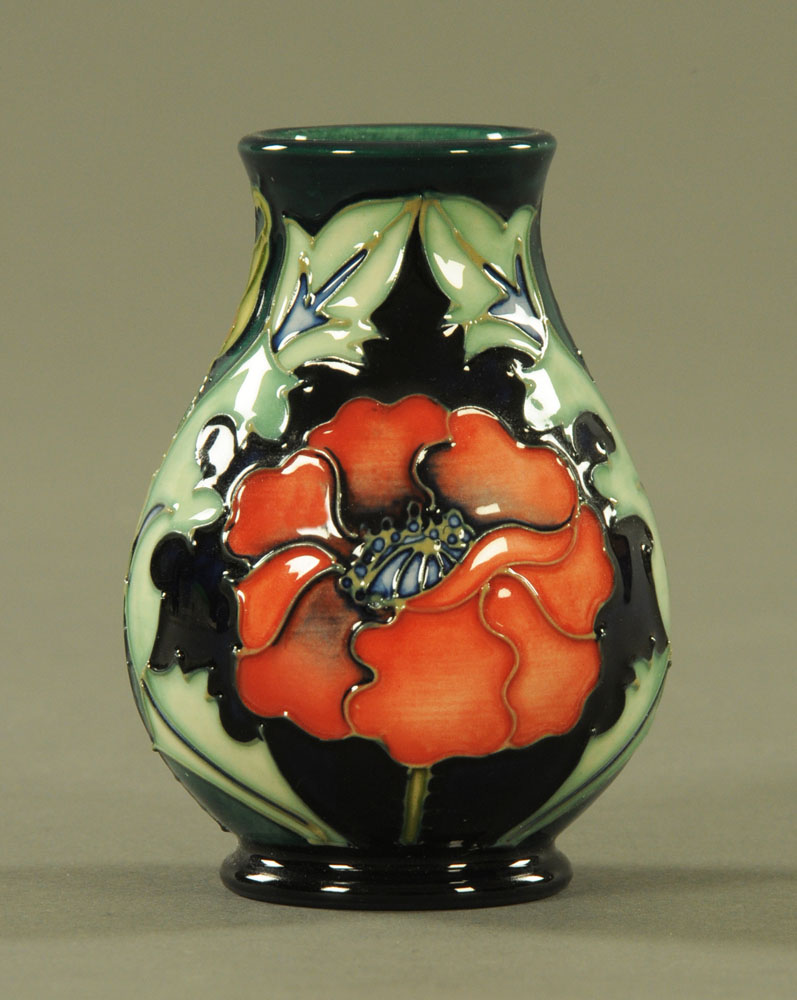 A Moorcroft "New Poppy" vase, designed by Rachel Bishop 1996. Height 9.5 cm.