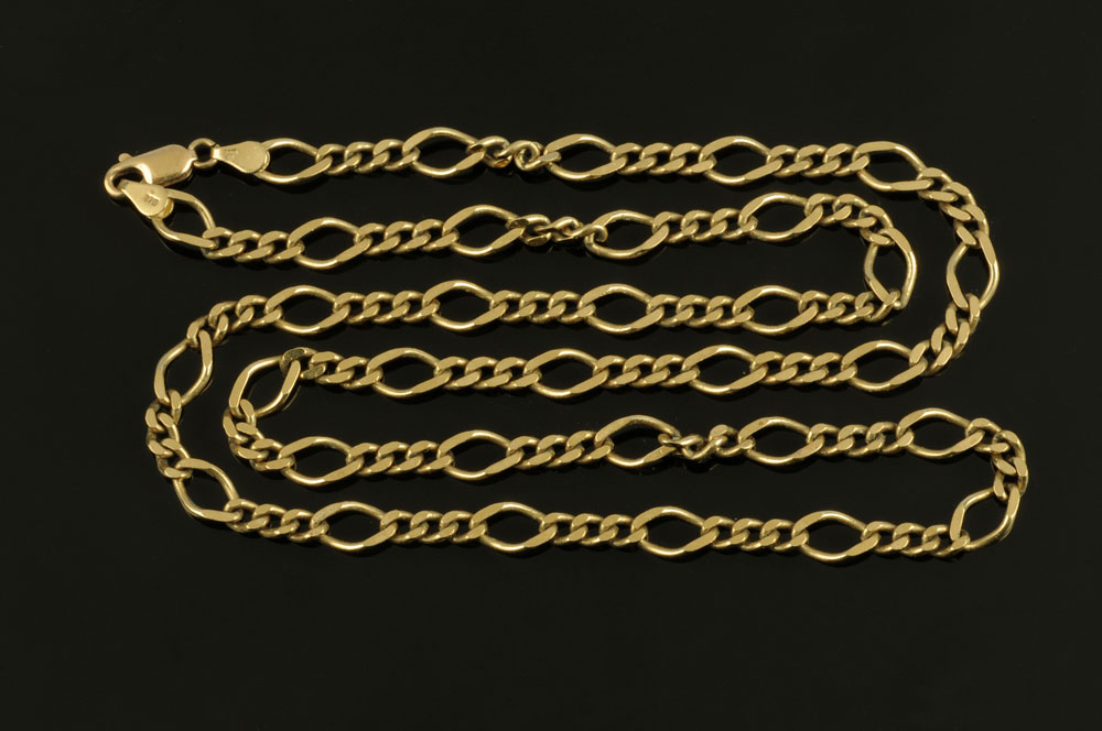 A 9 ct gold chain necklace, length 62 cm, 20.4 grams (see illustration).