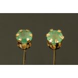 A pair of 9 ct gold emerald set ears studs.