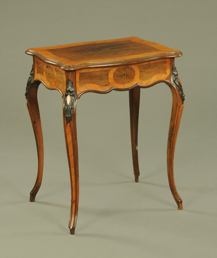 A continental rosewood and walnut dressing table,