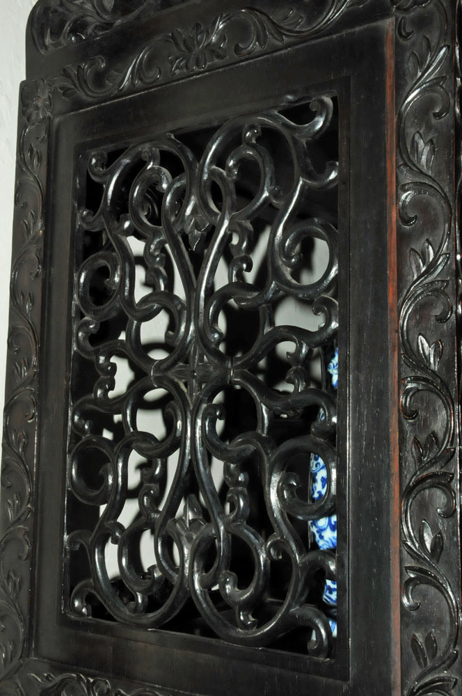 A 19th century Chinese hardwood cabinet in two sections, - Image 5 of 18