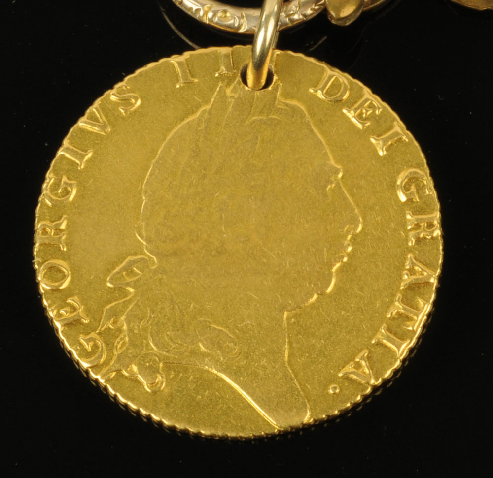 A George III 1794 gold spade guinea, sold together with a Victorian 9 ct gold muff chain, - Image 2 of 3