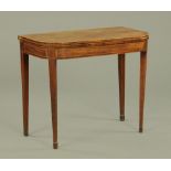 A George III mahogany turnover top boxwood strung tea table,