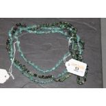 Two green stone bead necklaces