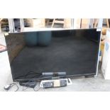 Sony flat screen television set with remote control