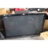 Large Panasonic flat screen television set with remote control