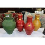 Four rustic vases